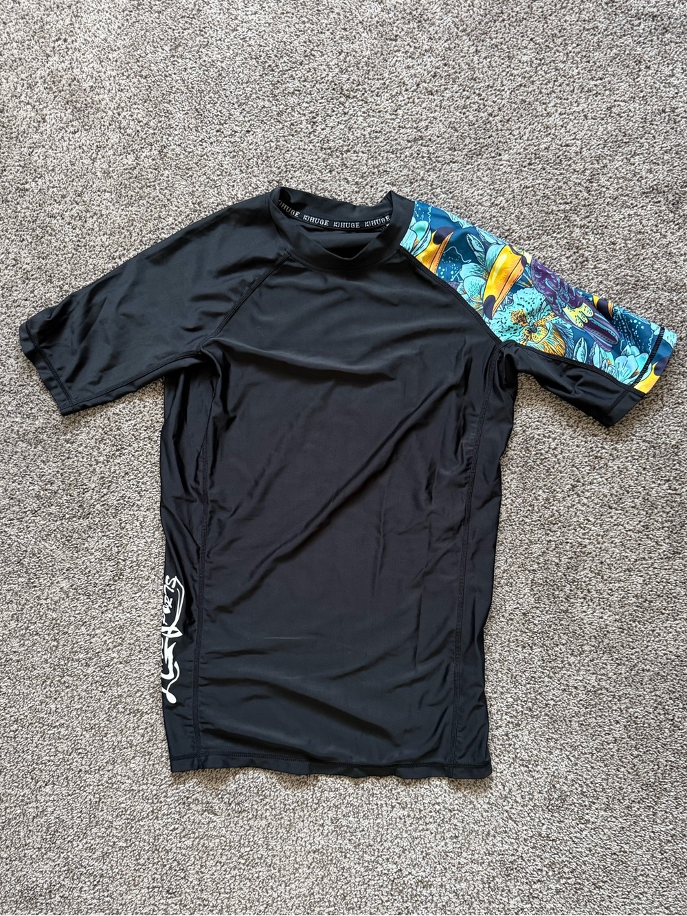 Huge Sports Men's Black Short Sleeve Swim Shirt With Blue Tropical Sleeve